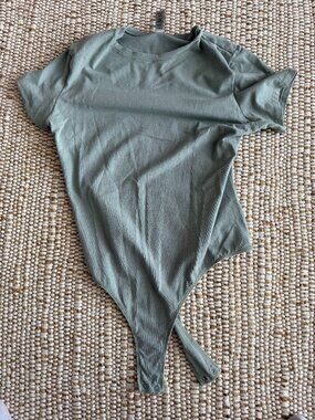 SKIMS Sage Green Short Sleeve Body Suit